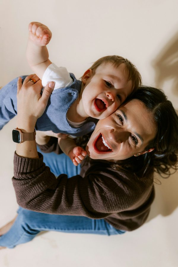 Happy mother and child laughing together